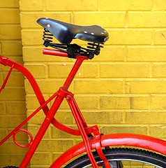 red bike yellow wall