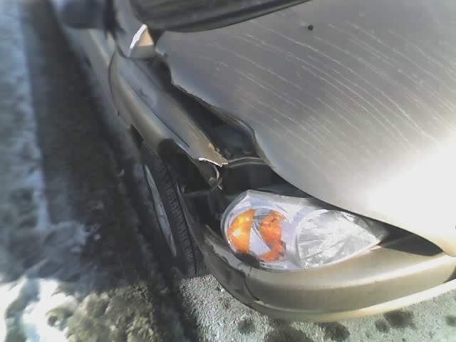 caraccident kia rio wreck butter crash cameraphone automobile moblog crushed headlight