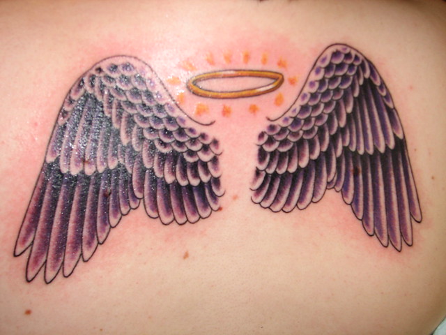 The final result of Chelle's angel wing tattooshe got the angel wings to 