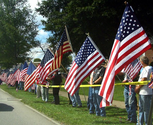 Flag Waving along funeral motorcade