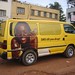 SMS till you drop -- mobile phone ad on van in Kampala, Uganda
