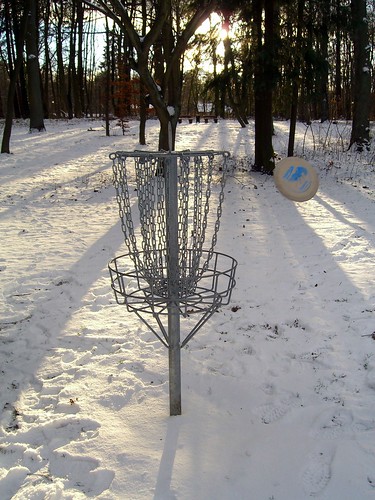 disc golfing in snow