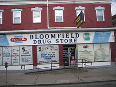 A plethora of signs, Bloomfield Drug Store