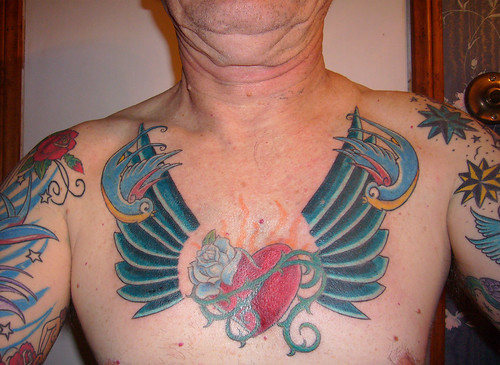 love heart tattoos with wings. Tag :pictures of heart tattoos
