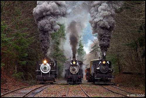 Awesome pic of three steam trains moving forward