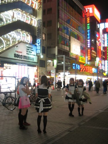 Maids outside Akihabara station