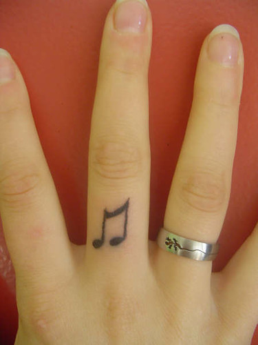 finger tattoo. finger tattoo