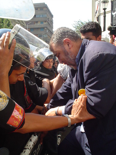 Mohammed Abdel Qodoos struggling with State Security forces during Kefaya protest for Judiciary Independence 2 Sept. 2005 at Press Syndicate, Cairo. Photo by Nora Younis