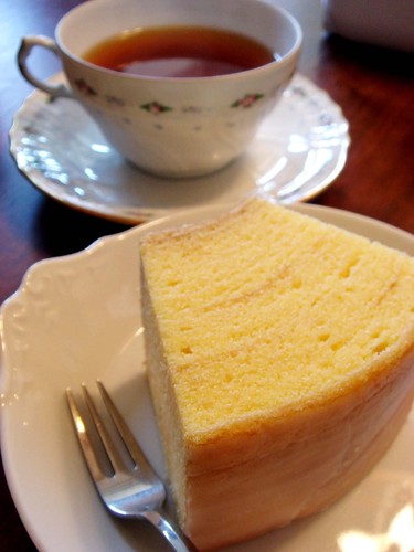 a piece of baumkuchen and a cup of tea