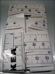 IKEA Paper Yardstick, wrapped around a business card
