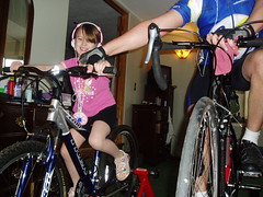 Dad adjusts Cycling Gert's bike