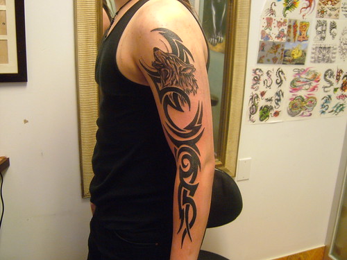 Man Arm TattoosWolf Tribal Tattoos Design