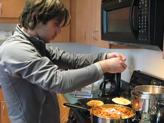 Cooking at John's. Noel with an Onion at the End for Crispiness..jpg