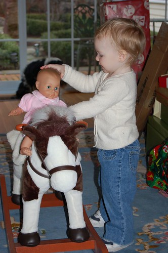 Baby rides the horsey