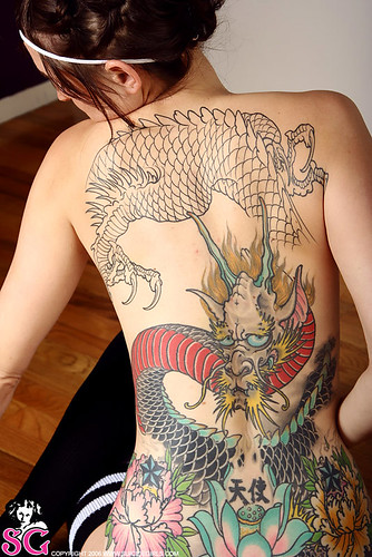 girl with dragon tattoo back. Female Full Back Tattoo of