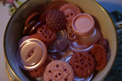 pink buttons in teacup