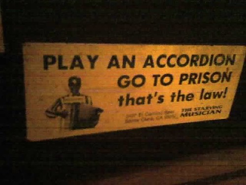 play an accordion