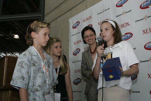 Jenna and Cayden Boyd present award to Taylor winner of 2005 Invention 