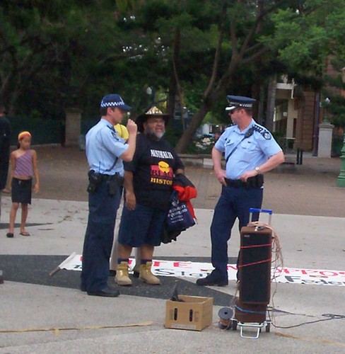 Sam Watson discusses arrangements with police - Invasion Day Rally and March, Parliament House, George St, Brisbane, Queensland, Australia 070126-1