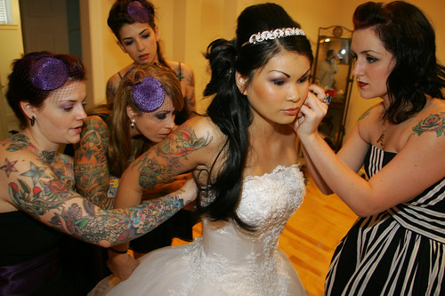matching couple tattoos. tattooed bride