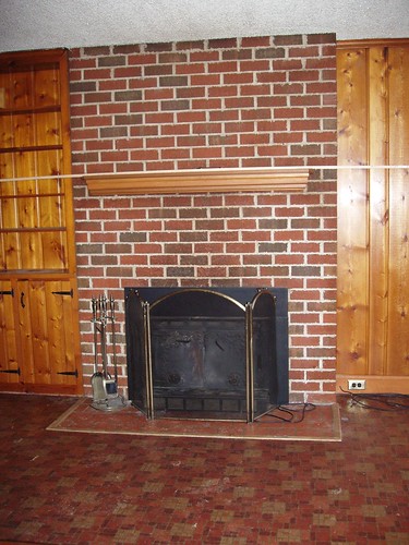 den - fireplace to be painted