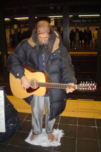 Barefoot guitar player
