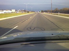 Every day on Highway 6 I pass this S marking in the   pavement