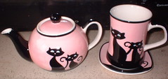 matching teapot, cup, and saucer