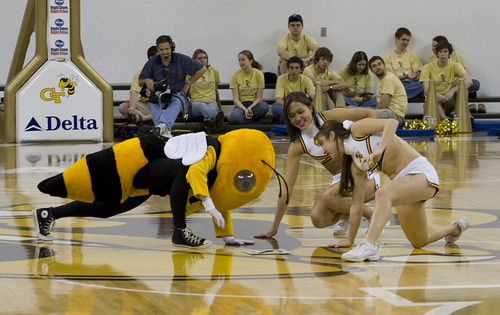 Georgia Tech Cheerleaders and mascot at a basketball game.
