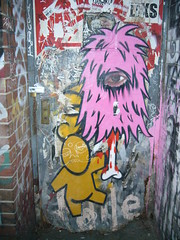 Street art, AOL man and pink drumstick, East Village
