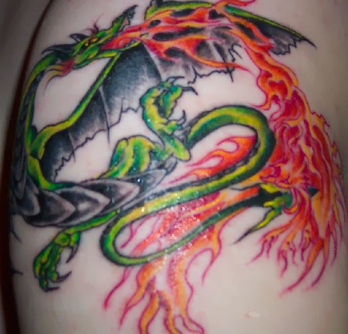 my dragon phoenix tattoo on my left arm 