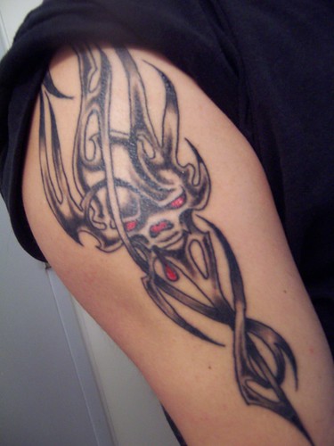 skull tattoos arm. Arm Tattoos : Tribal Skull Tattoos