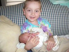 Nicholas holding baby