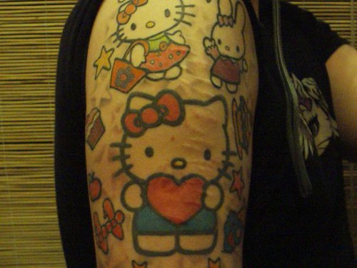 hello kitty tattoo art. My boi#39;s hello kitty tattoos