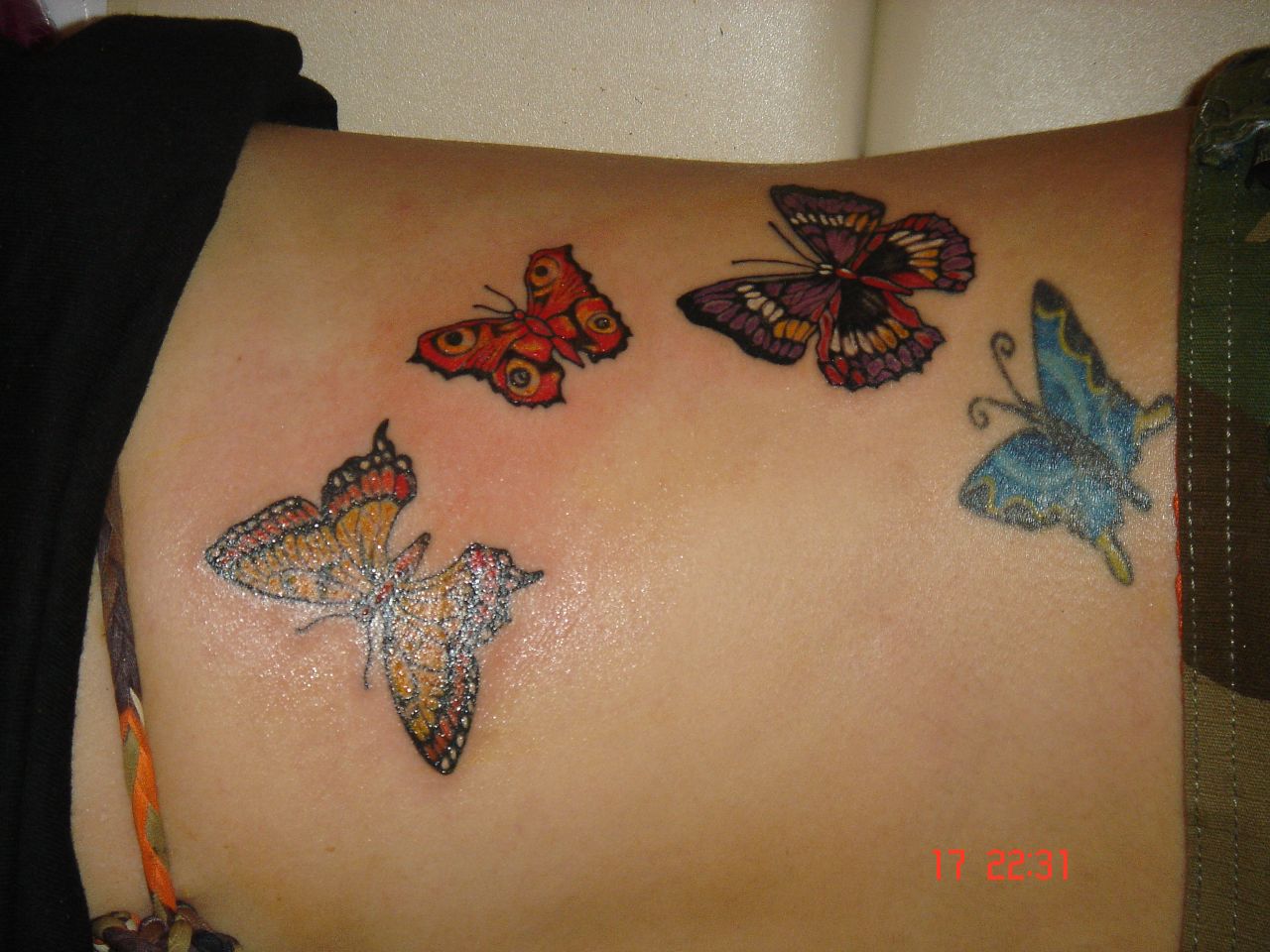 different colorful butterfly tattoo