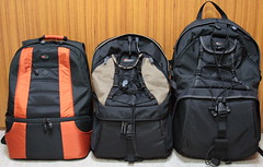 Three Lowepro's 2 or 3 compartment backpacks (...