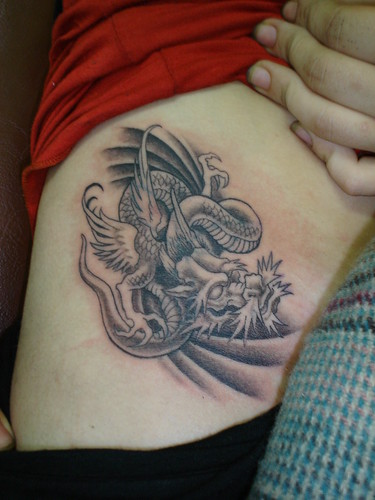 dragon on girl tattoo Dejavu Tattoo Studio Chiangmai Thailand by augrust
