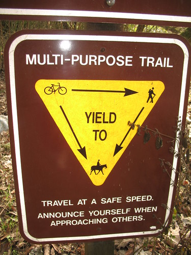 Bike path sign: Bikes yield to pedestrians