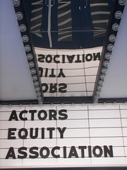 Reflection of the Atlas announcement sign