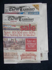 An example of an advertising wrap on a newspaper
