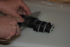 Cutting the sushi roll