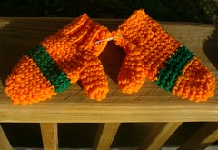 orange and green striped mittens