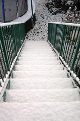 Photo of stairs covered in snow