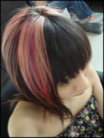 black hair and pink streaks. blonde and pink streaks.