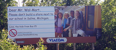 Billboard Protests Wal-Mart near school, on US...