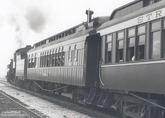 Strasburg Railroad steam locomotive # 90 and train departing Groffs Grove. Strasburg Pennsylvania USA. August 1990.