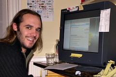 Photo of Danny in front of his computer while editing a Google Docs documment