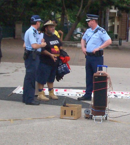 Sam Watson discusses arrangements with police - Invasion Day Rally and March, Parliament House, George St, Brisbane, Queensland, Australia 070126
