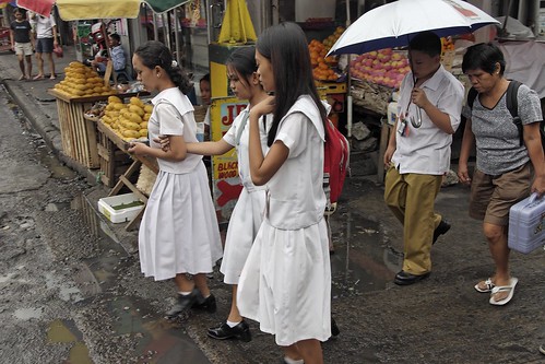 schoolgirls in uniform commuting to school street sidewalk scene  Buhay Pinoy Philippines Filipino Pilipino  people pictures photos life Philippinen      