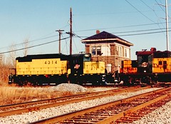 Northbound Chicago & NorthWestern RR freight train passing Argo Tower. (gone) December 1990.